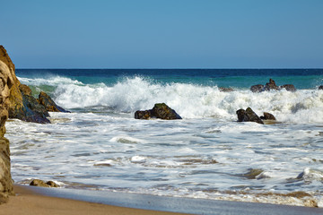 Waves beating against coastal rocks on the cliffs