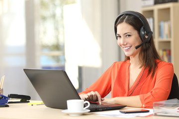 Freelancer working and looking at camera