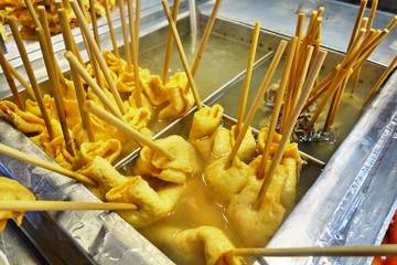 Korean street food. Odeng or Stick of fish cakes. They are skewered on a stick and left in a delicious broth.