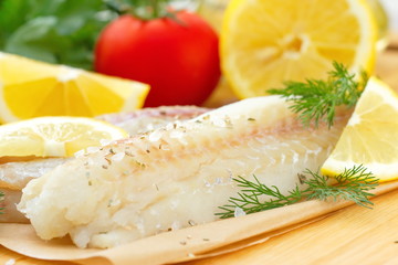 Raw fish with spices and lemon
