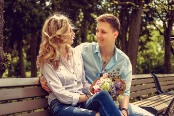 Naklejka premium Loving adult couple in summer park.