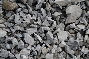gray broken stone background (road metal)