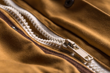Zipper on brown coat