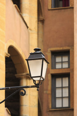 Fototapeta na wymiar Street light in Vieux-Lyon, the old city center of Lyon, France.