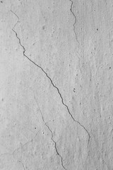 Detail of grunge weathered cement wall with cracks