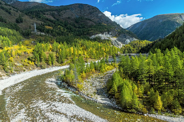 Fototapeta na wymiar Black Irkut River in Sayan Mountains
