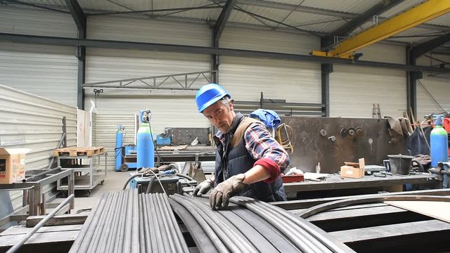 Industrial worker in metallurgy workshop