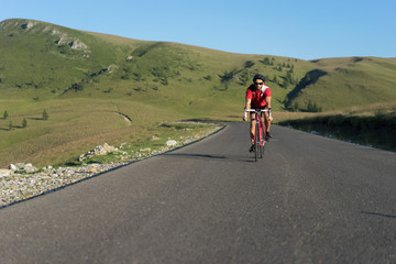 Obraz premium biker cycling on road
