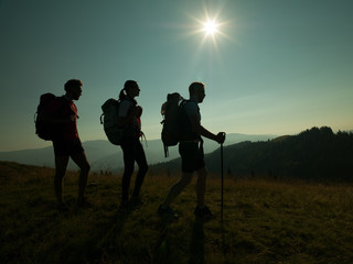 people hiking on the mountain