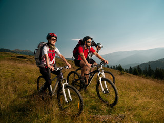 people on mountain bike