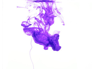 Abstract form of purple color in water, isolated on white background.
