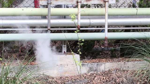 Smoke and hot steam drainage in Bangpu Industrial Estate, Thailand. Steam valve piping industry. Steam Assisted Gravity Drainage (SAGD)