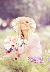 Fototapeta premium Woman Hat with Flowers Bouquet, Fashion Model Summer Park
