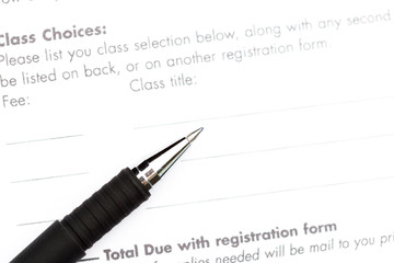 Close-up of pen on contract