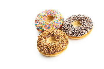 various donuts on white background
