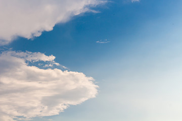Clouds against blue sky.