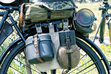Close up photo of old military bicycle with equipment - obrazy, fototapety, plakaty
