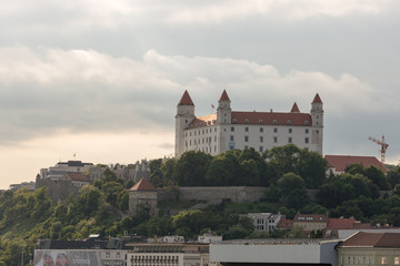 Fototapeta na wymiar Bratislava Castle closeup with Danube river & St. Martin cathedral