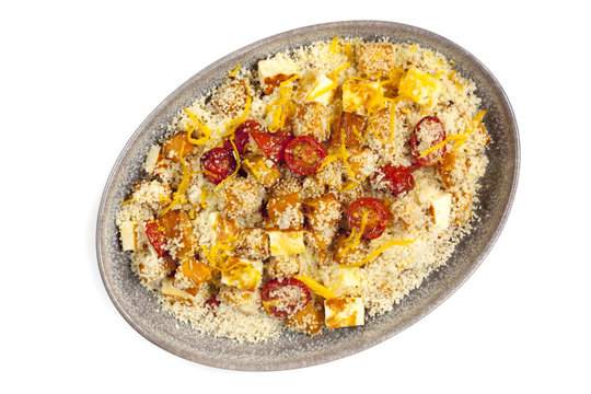 Couscous With Pumpkin Tomatoes And Halloumi Isolated