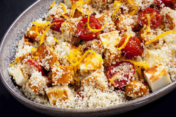 Couscous with Pumpkin Tomatoes and Halloumi Isolated