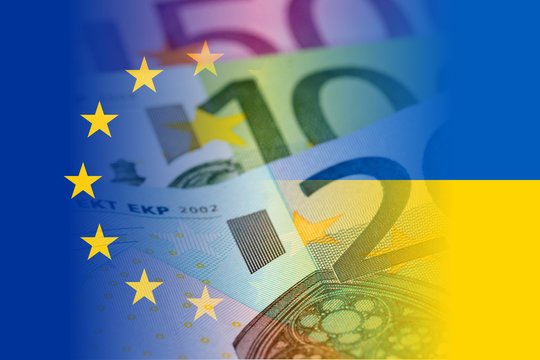 eu and ukraine flag with euro banknotes