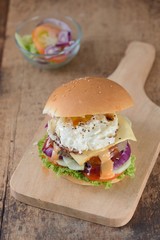 Burger with pork cutlete and egg