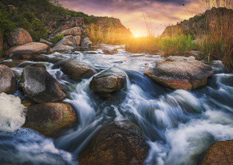 Canyon with fast rocky river