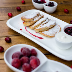 sweet pancakes with strawberry jam