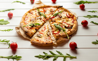 Cheese pizza with tomatoes . On rustic background. Top view