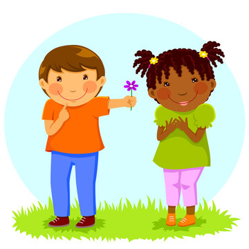 Caucasian boy gives a flower to an African girl