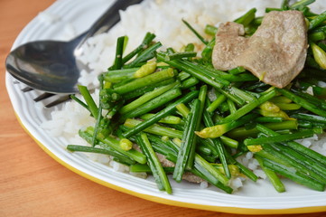 stir fried garlic chives with pork liver on rice