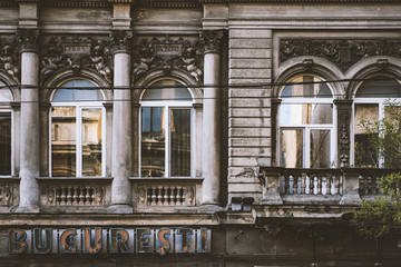 Bucharest - bucharest sign on an old building.