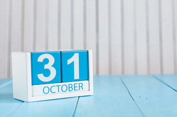 October 31st. Image of October 31 wooden color calendar on white background. Autumn day. Empty space for text