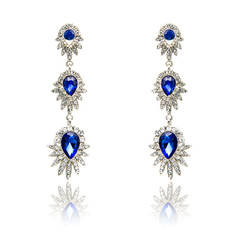 Pair of sapphire earrings isolated on white
