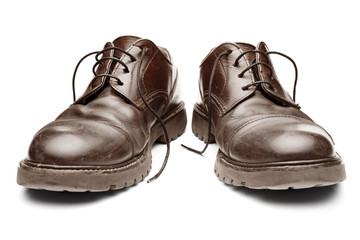 pair of old brown shoes