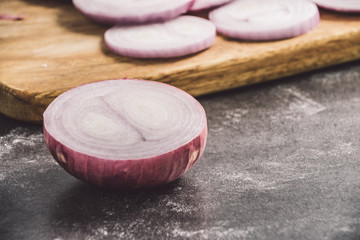 Shallots (red onion) on wood table

