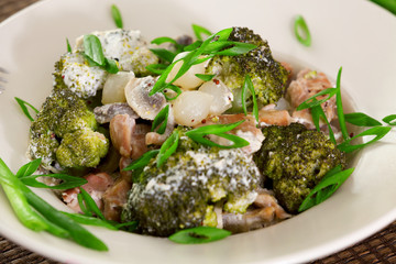 Slow cooked chicken, broccoli and mushroom dish.Close up