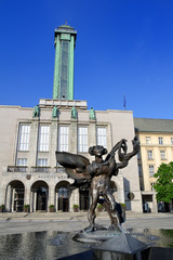 Naklejka premium New Town city hall (Nova radnice), Prokes's square (Prokesovo namesti), Ostrava, Czech Republic / Czechia. Statue of Icarus, building of municipality and viewing tower
