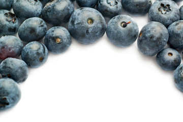 Bilberry or blueberry over isolated white background