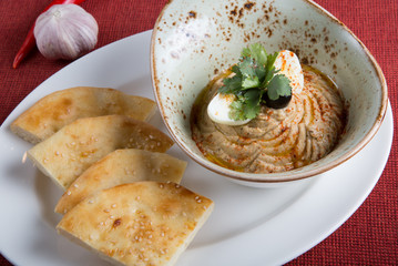 Fresh hummus in a bowl