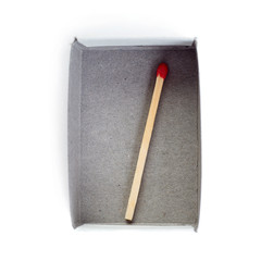 One Wooden match in box  isolated over the white background