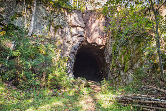 Entrance to dark cave in rock