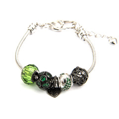 Fashion emerald bracelet isolated on white
