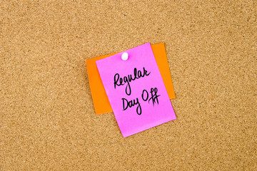 Regular Day Off written on paper note