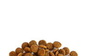 Dry food for Pets. Granules nutrition of dogs and cats on an isolated background. Food for the animals. Brown uniform pieces of dry food.