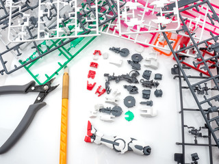 part of plastic model kit and tools for build leg robot