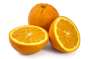 Two raw organic oranges, one cutted in half, isolated on white background