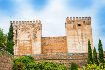 Fototapeta premium Traditional architecture of towers, part of Alhambra Palace in a day time, in Granada - Spain