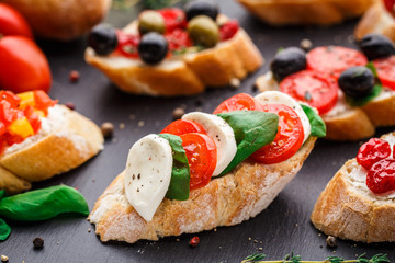 Bruschetta with tomatoes, mozzarella and basil