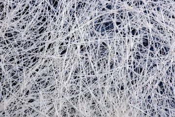 Абстрактное изображение из множества сплетённых нитей
